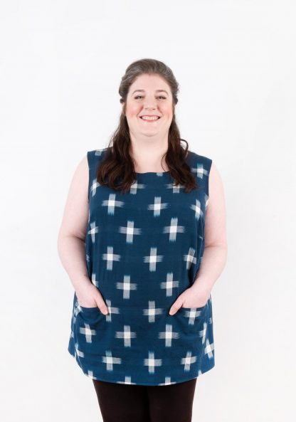 Women wearing Uniform Tunic sewing pattern by Grainline Studio. A sleeveless top pattern made in cotton, linen, voile or chambray with deep pockets and a round neckline.