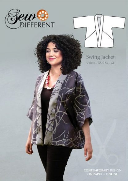 Woman wearing the Swing Jacket sewing pattern from Sew Different on The Fold Line. A jacket pattern made in linen, cotton, velvet, viscose, lightweight wool, chambray, denim, double knit, tweed or silk fabrics, featuring a relaxed fit, no fastening, large diagonal front pockets, wide trim acting as a facing and grown-on three quarter length sleeves.