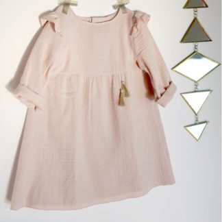 The Bouton d'Or Dress sewing pattern by Atelier Scammit. A dress pattern made in batiste, double gauze or jersey fabrics, featuring shoulder yokes and sleeve caps, in long sleeves, back button closure and gathered skirt.