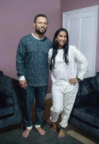 Man and Woman wearing the Women’s Moms Perri PJs sewing pattern from Pattern Paper Scissors on The Fold Line. A pyjamas pattern made in jersey or viscose jersey fabrics, featuring a round neck top with full length sleeve and cuff, trousers have full length leg with cuff and elasticated waist.