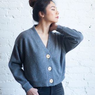 Women wearing the Marlo Sweater sewing pattern by True Bias. A cardigan pattern made in stretch or non-stretch fabrics, featuring an oversized fit, dropped shoulder, long sleeves, deep V-neck and large button front closure.