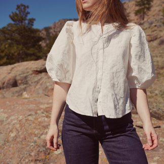 Women wearing the Anthea Blouse sewing pattern by Anna Allen. A blouse pattern made in cotton, linen, voiles, lawns or silk fabrics, featuring elbow length puffed sleeves, relaxed fit, button front closure with a fold-over placket and bias faced neckline.