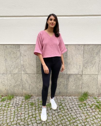 Woman wearing the Phoebe Top sewing pattern by Tammy Handmade. A cropped top pattern made in cotton, linen, double gauze or viscose fabrics, featuring ¾ length sleeves, dropped shoulder, v-neckline and relaxed fit.
