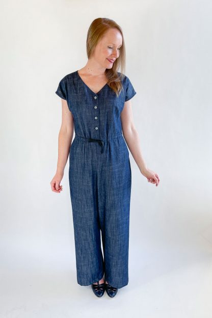 Woman wearing the Farris Jumpsuit sewing pattern from Jennifer Lauren Handmade on The Fold Line. A jumpsuit pattern made in rayon, silks, crepes, cotton lawn, linen, chambray, denim or pinwale corduroy fabrics, featuring grown-on sleeves, V neckline, angled bust darts, wide-legged pant, button front bodice and drawstring waist.