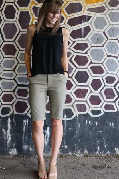 Woman wearing the Chi-Town Chinos sewing pattern from Alina Design Co on The Fold Line. A shorts pattern made in cotton twill, chambray, denim, linen, linen blends or wool blend fabrics, featuring additional pattern pieces to make fitted, knee-length shorts with back welt pockets.