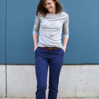 Woman wearing the Chi-Town Chinos sewing pattern from Alina Design Co on The Fold Line. A trouser pattern made in cotton twill, chambray, denim, linen, linen blends or wool blend fabrics, featuring additional pattern pieces to make semi-fitted, full-length trousers with back welt pockets.