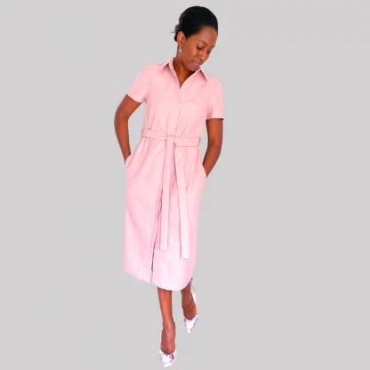 Woman wearing the Effie Shirt Dress pattern from Michelle Sews on The Fold Line. A shirt dress pattern made in viscose/rayon, crepe, linen, cotton or chambray fabrics, featuring a straight-cut profile, hidden button placket, collar, below-knee length, inseam pockets and self-fabric belt.