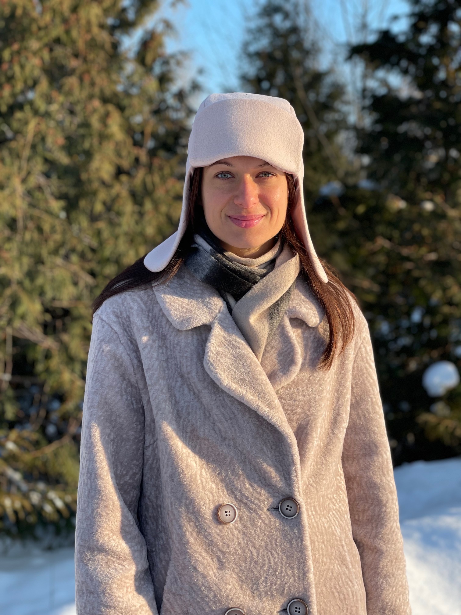 Women wearing the Unisex Aviator Hat sewing pattern from Kate’s Sewing Patterns on The Fold Line. A lined hat pattern made in coat, jacket or faux fur fabrics, featuring two side panels, central panel and front brim.