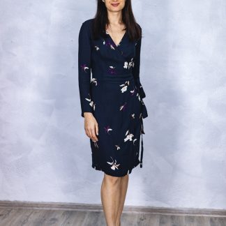 Women wearing the Diane Dress sewing pattern from Kate’s Sewing Patterns on The Fold Line. A wrap dress pattern made in cotton, linen, silk or viscose fabrics, featuring waist darts, knee-length skirt, full length sleeves, side ties and V-neck.