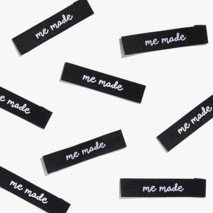 Photo showing 'Me Made' Woven Labels from Kylie & The Machine on The Fold Line. A washable, durable and non-scratchy fabric label featuring the words 'Me Made' all ready to be sewn into your handmade clothes.
