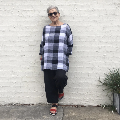 Woman wearing the Athina Top sewing pattern from Tessuti Fabrics on The Fold Line. A top pattern made in linen or lightweight wool fabrics, featuring a boxy style, extended shoulders, dropped sleeves and tunic length.