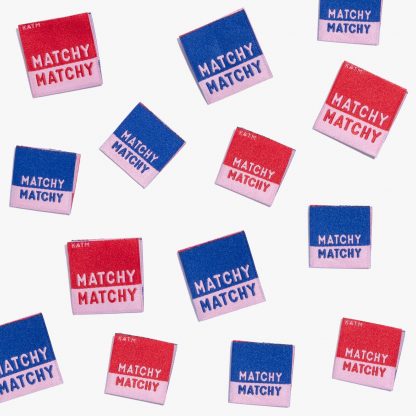 Photo showing 'Matchy Matchy' Woven Labels from Kylie & The Machine on The Fold Line. A washable, durable and non-scratchy fabric label featuring the words 'Matchy Matchy' all ready to be sewn into your handmade clothes.