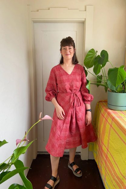 Woman wearing the Acton Dress sewing pattern from In the Folds on The Fold Line. A dress pattern made in linen, cotton, gauze, chambray, sateen, silk, viscose or rayon fabrics, featuring extra add-ons such as new two sleeve options and new bodice.