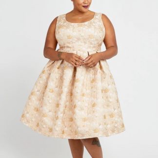 Woman wearing the Upton Dress sewing pattern from Cashmerette on The Fold Line. A dress pattern made in cotton, linen, double gauze or upholstery fabrics, featuring multiple bodice, skirt, sleeve and neckline options for over 350 combinations!