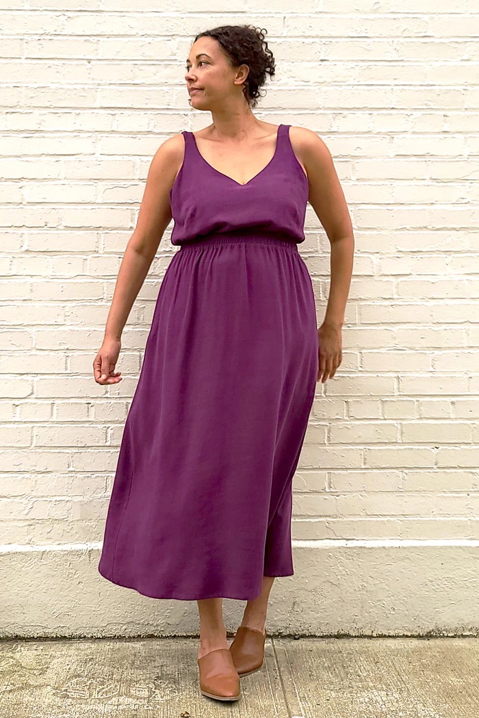 Women wearing the Sauvie Sundress sewing pattern from Sew House Seven on The Fold Line. A sundress pattern made in linen, linen blends, cotton lawn, silk noil, silk crepe de chine or wool gabardine fabrics featuring a low front and back V-neck, narrow straps, in-seam pockets, wide elasticised waist and midi length.