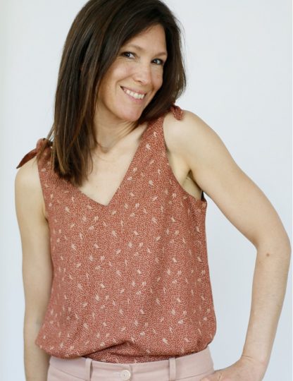 Women wearing the Talisman Top sewing pattern from Atelier Scämmit on The Fold Line. A sleeveless top pattern made in batiste, chiffon or viscose fabrics, featuring a V-neckline at the front and back, decorative bows on the shoulders and relaxed fit.