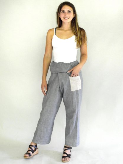 Women wearing the 161 Thai Fisherman's Pants sewing pattern from Folkwear on The Fold Line. A trouser pattern made in broadcloth, ikats, lightweight twills, linen, lightweight wool, rayon or silk fabrics, featuring a wrap waist with ties, relaxed fit, full length, straight wide leg, patch front pocket and fold over waist.