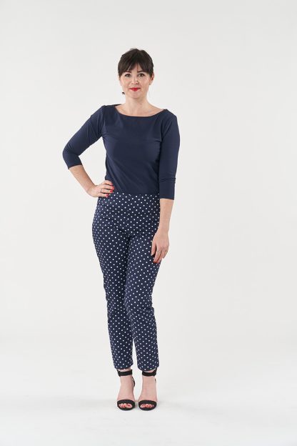 Women wearing the Ultimate Trousers sewing pattern from Sew Over It on The Fold Line. A trouser pattern made in cotton, corduroy, wool crepe or denim fabrics, featuring a slim-fit, ankle length and invisible side zip.
