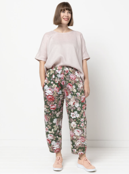 Woman wearing the Bob Woven Pant sewing pattern from Style Arc on The Fold Line. A trouser pattern made in washed linen, light wool, rayon or crepe fabrics, featuring a balloon shape, relaxed fit, elastic waistband, slightly cropped length, and in-seam pockets.