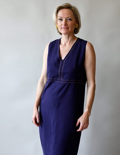 Woman wearing the Slip Dress sewing pattern from The Maker's Atelier on The Fold Line. A slip dress pattern made in tencel, viscose, silks, cottons, or linens fabrics, featuring a pull-on style, V-neck, sleeveless, vertical bust darts, and raised waist seam.