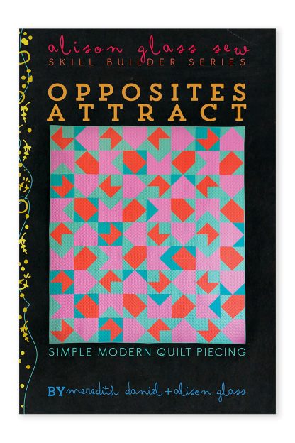 Photo showing the Opposites Attract Quilt sewing pattern from Alison Glass on The Fold Line. A quilt pattern made in quilting cotton fabrics, featuring a simple modern design.