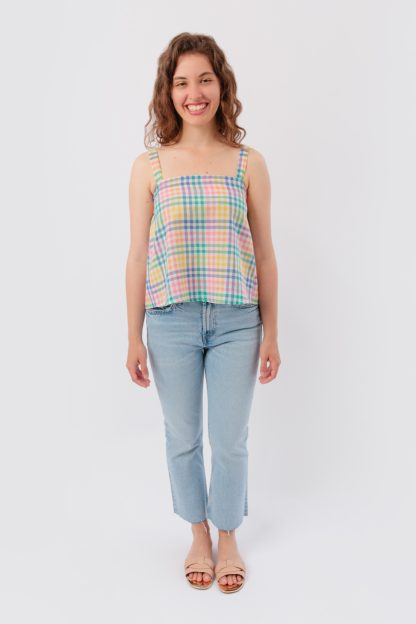 Woman wearing the Riley Top sewing pattern from Sew Love Patterns on The Fold Line. A top pattern made in cotton, viscose, tencel, crepe, rayon and bamboo silk fabrics, featuring narrow shoulder straps, boxy fit, and straight neckline with elasticated back.