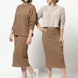 Women wearing the Yoyo Knit Top sewing pattern from Style Arc on The Fold Line. A knit top pattern made in sweater knit, unbrushed fleece, knit jersey, or windcheater fabrics, featuring a boxy fit, crew neckline with V-shaped insert, slightly dropped shoulders, long sleeves with cuffs and cropped or standard length.