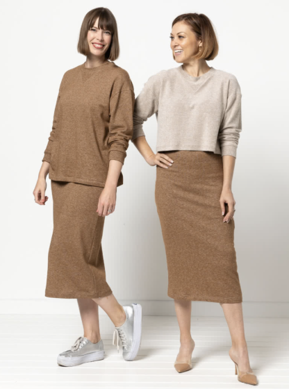 Women wearing the Yoyo Knit Top sewing pattern from Style Arc on The Fold Line. A knit top pattern made in sweater knit, unbrushed fleece, knit jersey, or windcheater fabrics, featuring a boxy fit, crew neckline with V-shaped insert, slightly dropped shoulders, long sleeves with cuffs and cropped or standard length.