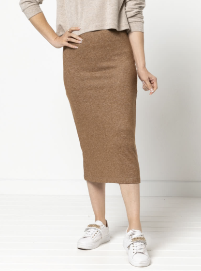 Women wearing the Yoyo Knit Skirt sewing pattern from Style Arc on The Fold Line. A pencil knit skirt pattern made in sweater knit, jersey or ponte fabrics, featuring a pull-on style, elasticated waist and calf length.