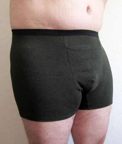 Man wearing the Emil Boxer Brief sewing pattern from Primrose Dawn on The Fold Line. A boxer pattern made in stretch knit fabrics, featuring a horizontal pouch opening, two inseam lengths and elastic waistband.