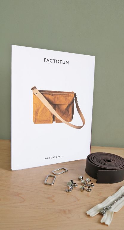 Photo showing the Merchant & Mills Factotum Pattern and Hardware Kit Bundle. A fun and practical sewing project for any enthusiastic maker, and this bundle includes the sewing pattern plus all the hardware you need. A perfect gift or Christmas present.