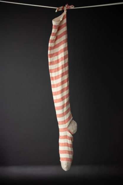 Photo showing the Stocking sewing pattern from Merchant & Mills on The Fold Line. A stocking pattern made in cotton and linen fabrics, featuring a festive stocking in three lengths with ties.