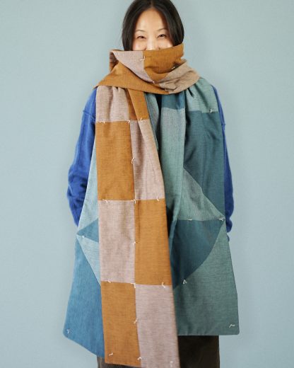 Woman wearing the Matchy Matchy Quilt Scarf Bundle. A fun and easy sewing project for any sewist, this bundle includes the Butter Quilt Scarf and the Sugar Quilt Scarf. A perfect gift or Christmas present.